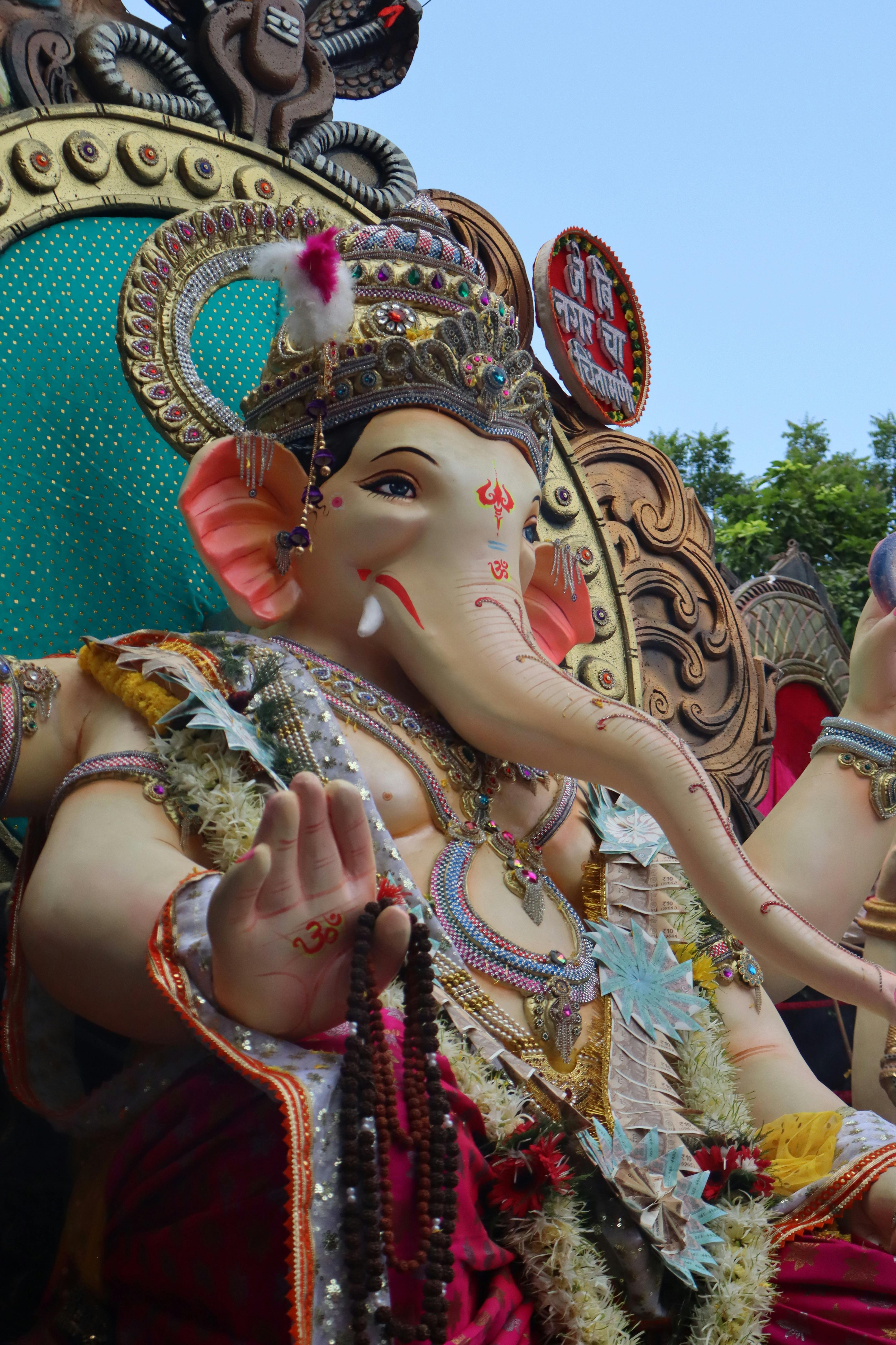 手机壁纸游戏壁纸_印度充满活力的GaneshVisarjan节雕像